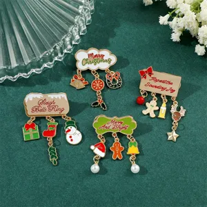 Detailed view of Christmas enamel brooches with snowman and gingerbread man charms