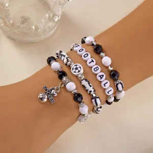 Detailed view of a soccer-themed beaded bracelet set featuring FOOTBALL letter beads.
