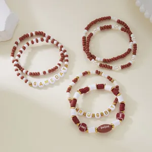 Detailed view of Game Day and Rugby themed beaded bracelet set with football charms