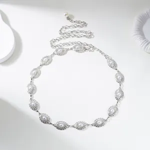 Detailed view of vintage silver carved waist chain featuring elegant faux pearl inlays