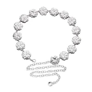 Close-up of vintage silver floral engraved waist chain showing metal leaf texture detail