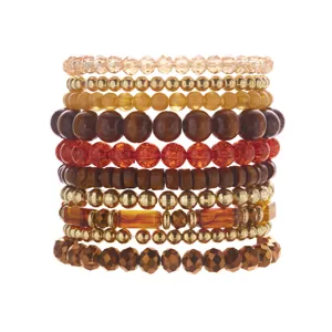 Detailed macro shot of stacked Bohemian multi-layer bead and wood bead bracelet set