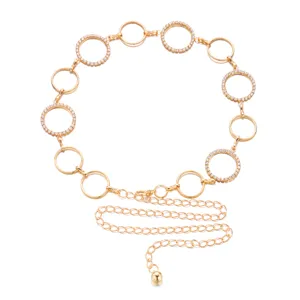 Detailed shot of golden hollow circular body chain belt featuring sparkling rhinestones.
