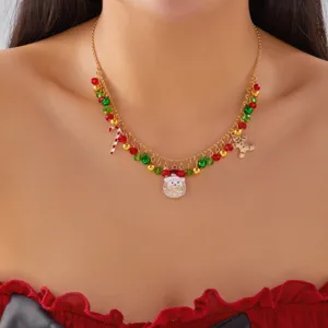 Collar festivo de Navidad con dijes de Papá Noel, bastón de caramelo y hombre jengibre