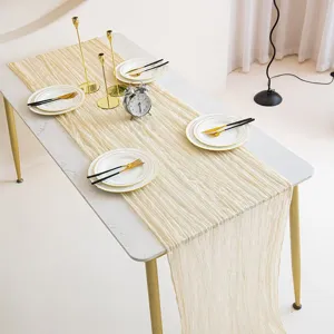 Detailed view of the elegant pleated cheese cloth table runner in a cozy dining room setting.