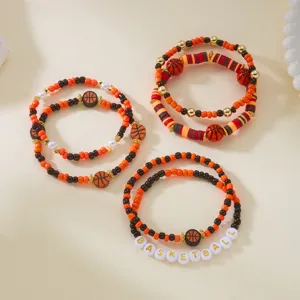 Detailed view of handmade basketball theme polymer clay beaded bracelet set for Game Day