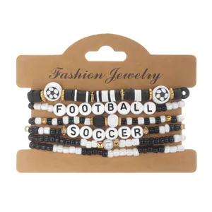 Sports themed black and white beaded bracelet set with Football and Soccer lettering