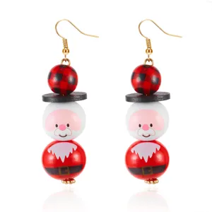 Boucles d'oreilles festives en perles de bois Père Noël pour les fêtes de fin d'année