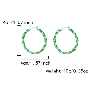 Green glitter twisted hoop earrings with 4cm diameter and 10g weight product details