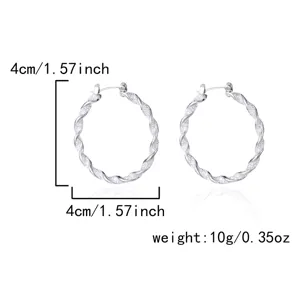 Detailed view of silver twisted hoop earrings showing 4cm diameter and 10g weight