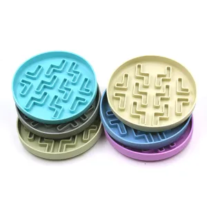 Close-up of colorful silicone pet slow feeder mats showing internal maze texture