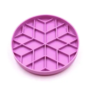 Round purple silicone pet lick mat for dogs and cats with geometric slow feeder grid