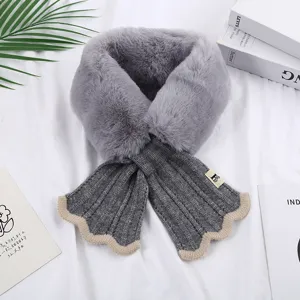 Detail view of winter women faux fur and knit spliced scarf with scalloped edge gray warm