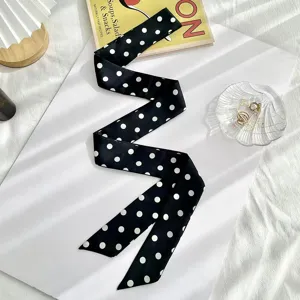 Black and white polka dot skinny silk scarf, elegant hair ribbon or stylish bag accessory.