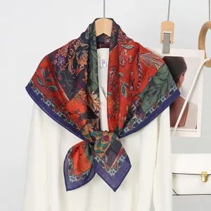 Exquisite silk wool square scarf featuring double-sided retro floral print and elegant navy border.