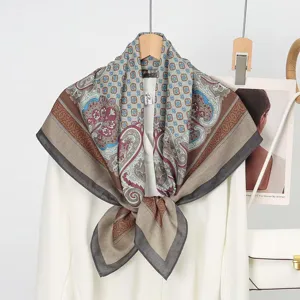 Exquisite silk wool square scarf with vintage paisley print, elegant warm accessory.