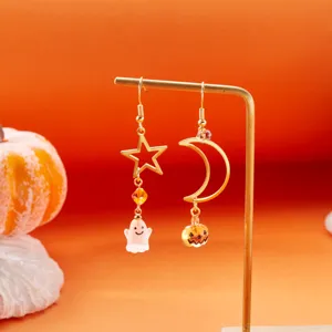 Pendientes festivos de Halloween con cuentas de cristal y colgantes de fantasma y calabaza.