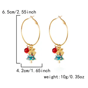 Detail view of festive Christmas tree hoop earrings with bell charms, 6.5cm height