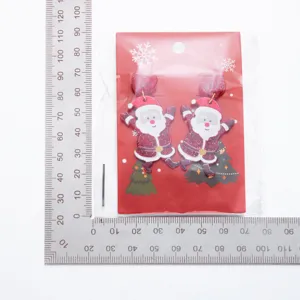 Cute Santa Claus acrylic heart earrings with metal ruler scale showing dimensions