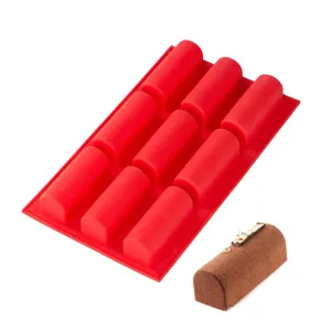 Close up of 9 cavity long silicone baking mold cavity detail for chocolate mousse dessert making