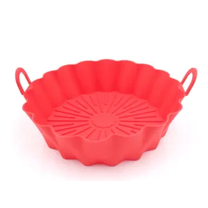 Silicone air fryer pot detail view, red fluted baking liner with handles, heat resistant.