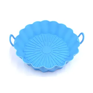 Silicone air fryer pot detail showing flexible food grade material and bottom oil drainage grooves.