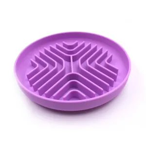 Detailed view of the purple silicone pet slow feeder bowl, featuring maze barriers.