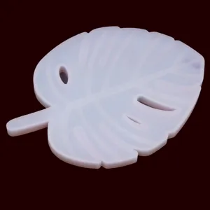 Monstera leaf silicone mold detail, flexible resin casting tool for DIY craft coasters.