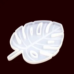 Silicone mold for resin casting, monstera leaf shape DIY epoxy coaster making tool detail.