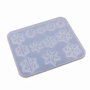 Close-up detail shot of the transparent silicone snowflake mold, ideal for DIY epoxy resin crafts.