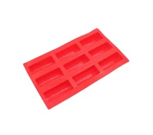 9-cavity silicone rectangular baking mold detail view, flexible red mousse pastry tool.