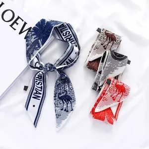 Chic skinny silk twilly scarf for women, versatile hair ribbon and bag accessory.