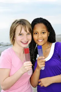 Silicone ice pop mold with oval lid, flexible DIY ice cream popsicle maker tube tool.