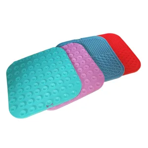 Detailed view of colorful silicone pet lick mats with multiple textures for slow feeding