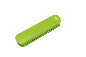 Green silicone skillet handle cover detail, heat resistant sleeve with floral design.
