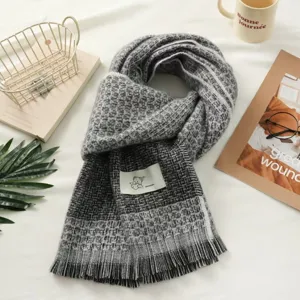 Detailed view of the Korean style plaid scarf with a cute bear label. Cozy winter accessory.