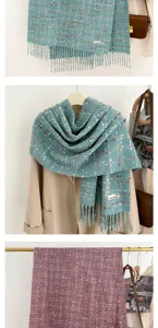Detailed view of cozy cashmere-feel plaid fringe scarf in teal and purple, autumn winter warmth.