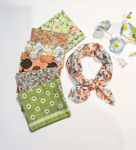 Cotton linen square scarf detail, floral and pumpkin print, soft breathable summer fabric.
