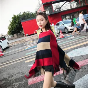 Fashionable striped knit poncho with irregular fringe details for spring and autumn outfits