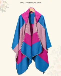 Stylish bohemian striped oversized shawl poncho with vibrant blue and pink patterns