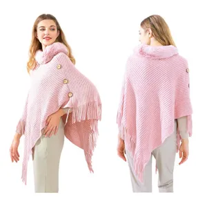 Detailed front and back views of a warm pink knitted poncho with faux fur collar and fringe