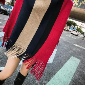 Close-up of the elegant tassels and colorful striped pattern on the knitted shawl