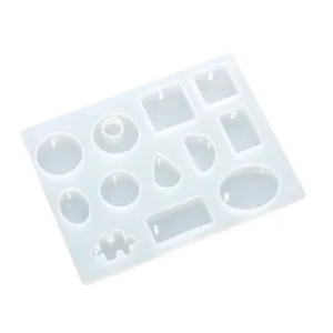 Clear silicone resin pendant mold DIY jewelry making tool featuring multiple geometric shapes.