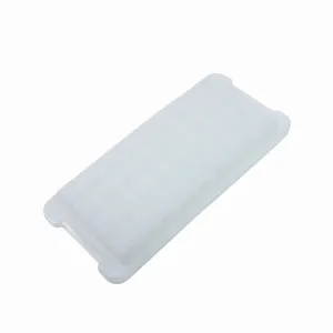 Close-up detail of a translucent flexible silicone 36-grid ice cube tray with a fitted lid.