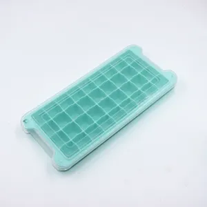 Bandeja de hielo de silicio con tapa transparente, molde flexible para bebidas y congelación.