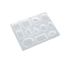 Clear silicone mold detail showing geometric shapes pendant tray for DIY resin crafting.