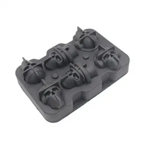 Detailed view of a grey 6-cavity skull silicone ice cube tray mold for Halloween gifts