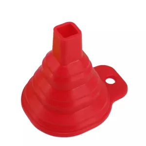 Red silicone foldable funnel, portable telescopic kitchen tool with hanging hole for daily use.