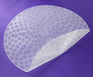Silikon-Dampfgarer-Matten-Detailansicht, rundes Mesh-Design zum Kochen und Backen in der Küche.