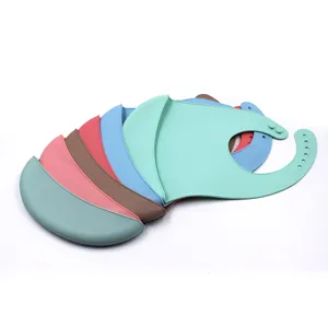 Silicone baby bib waterproof soft food catcher detail view showing flexible multi-color design.